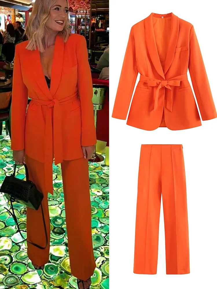 broekpak dames feestelijk - oranje glamour voor een stralende entree